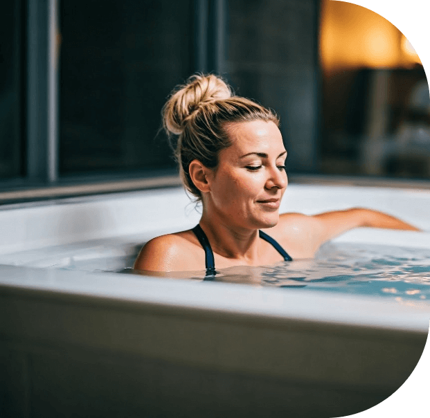 shutterstock2587940479 | Icelift Woman relaxing in a bathtub with eyes closed leaning back against the tub rim